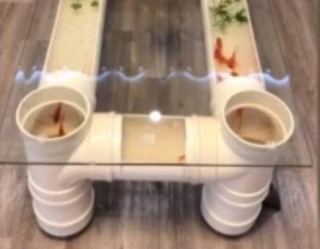 Virales Video „Kreativer Mann aus der Provinz Sichuan im süden Chinas baute für 23 amerikanischen Dollar einen Tee-Tisch mit integriertem Aquarium“